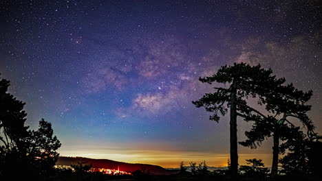 Milky-Way-band-descends-below-clouds,-night-sky-from-mount-olympos-Timelapse
