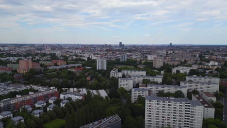 Great-aerial-top-view-flight-tv-tower-city-Berlin-Libeskind-Building,-Germany-Summer-day-2023