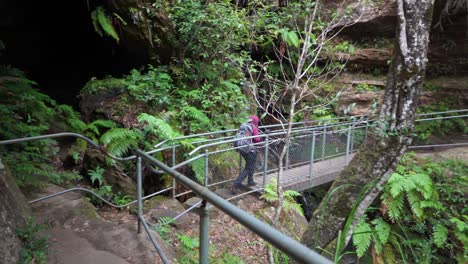 Indigenous-Australian-girl-hiking-through-the-Blue-Mountains,-NSW-Australia