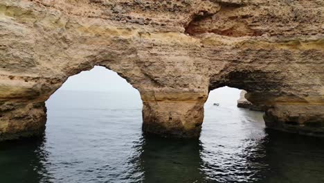 Drone-shot-of-arches-on-the-Algarve-Coast-in-Portugal