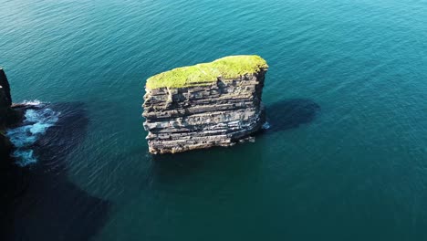 Drone-shot-looking-down-on-Downpatrick-Head-and-flying-right-to-left