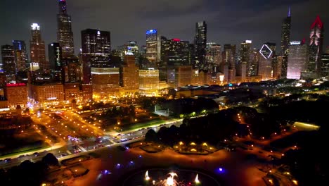 Chicago-USA-Cityscape-Skyline-at-Night,-Aerial-View-of-Millennium-Park-and-Skyscrapers-in-Lights