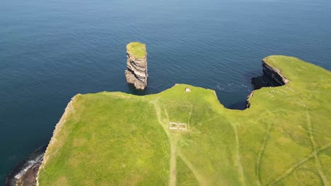 Drone-shot-flying-around-Downpatrick-Head-from-left-to-right-showing-the-64-Eire-sign