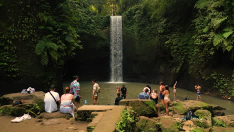 Tibumana-waterfall---tourist-attraction-site,-handheld-view