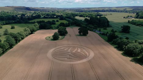 Warminster-2023-crop-circle-pattern-on-vast-British-farmland-harvested-wheat-field-aerial-orbiting-view