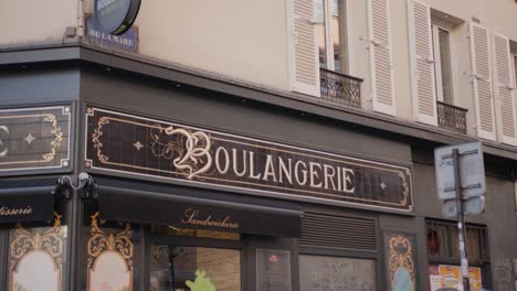 Front-store-of-a-Boulangerie-Patisserie,-a-typical-french-bakery-and-pastry-shop-selling-bread-and-pastries