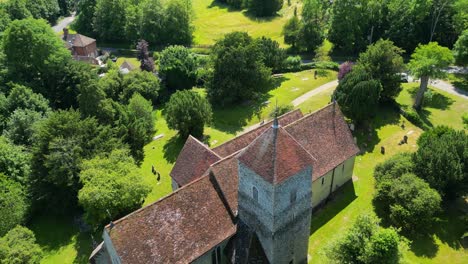 A-tilted-push-in-shot-flying-over-St-Lawrence-the-Martyr-church-in-Godmersham