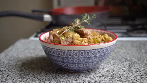 Smoking-bowl-of-pasta-with-meat-pieces