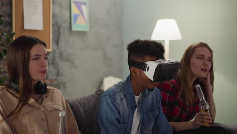 Women-and-black-guy-with-VR-headset-enjoy-baseball-game