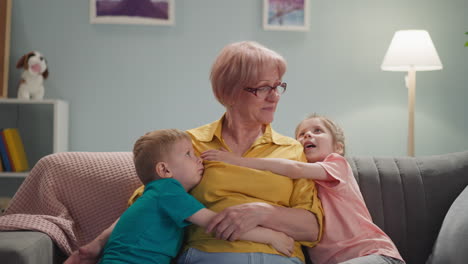 kids-hug-their-beloved-grandmother-at-home