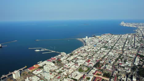 Overflying-Veracruz-city,-with-its-port