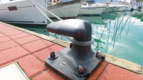 Moor-a-boat-on-a-bollard-on-the-quay-of-the-port-of-denia