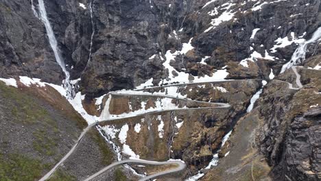 Trollstigen-Trolls-road-winding-up-vertical-hillside-in-Rauma-Norway---Spectacular-and-unique-road