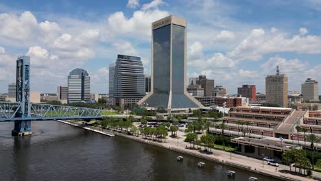 Downtown-Jacksonville-Florida-viewed-from-stationary-drone-near-main-street,-John-T-Alsop,-bridge-over-St-Johns-River
