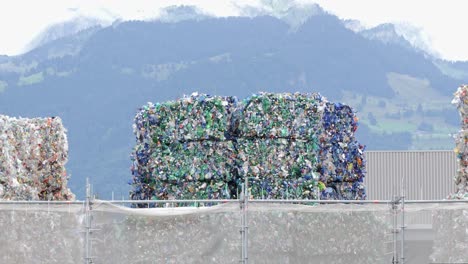 Massive-square-stacks-of-plastic-bottles-for-recycle,-static-view