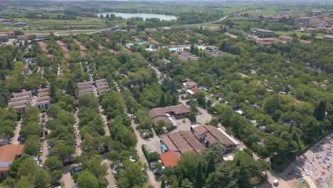 Panoramic-aerial-view-above-luxury-condo-campsites,-bella-italia,-lake-garda-italy