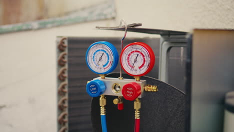 Close-up-of-freon-manifold-gauges