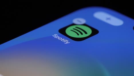 Tapping-On-Spotify-App-Icon-On-Mobile-Touchscreen-And-Deleting-It