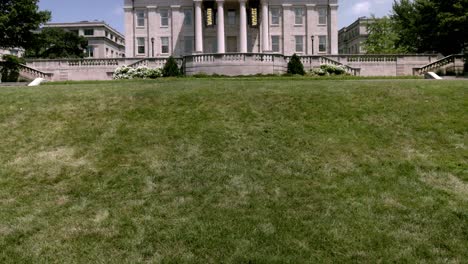 Old-Capitol-building-on-the-campus-of-the-University-of-Iowa-in-Iowa-City,-Iowa-with-gimbal-video-tilting-up-wide-shot