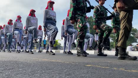 Rows-of-Indonesian-soldiers-and-students-,-training-to-prepare-for-Indonesia's-independence-celebrations