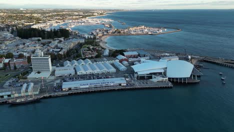 Aerial-birds-eye-shot-showing-port-area-of-Fremantle-with-Gage-Roads-Freo-Brewery-during-sunset-time---Perth-City,Australia