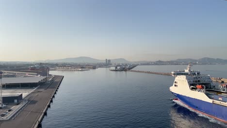 Landscape-view-of-a-moving-cargo-vessel-at-Marseille-Provence-Cruise-Center-,-a-port-city-in-Southern-France