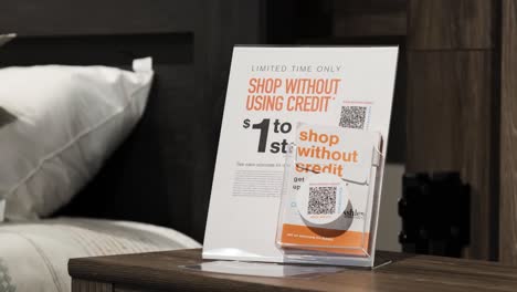 Shop-without-using-credit-personal-home-bedding-dining-furniture-scan-loan-financing-application-card-inside-an-Ashley-HomeStore-american-Shopping-Center-Mall-in-Chicago-Illinois