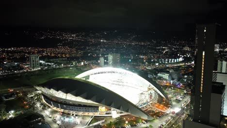 SAN-JOSE,-COSTA-RICA---MARCH-28,-2023:-time-lapse-of-the-Estadio-Nacional-,-La-Sabana-Metropolitan-Park,-brightly-lit