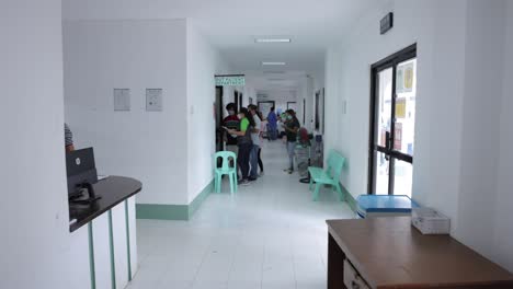 Hospital-Hallway-People-Waiting-For-Treatment