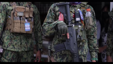 Asian-Soldiers-Patrolling-Street-Gun-War-Closeup-Coup