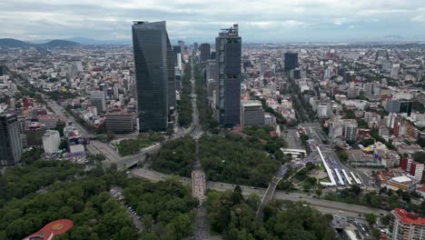 View-of-Paseo-de-la-Reforma-from-Chapultepec,-in-the-background-the-Torre-BBVA-and-Mayor,-Mexico-City,-Mexico