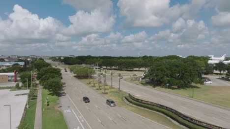 Aerial-drone-view-from-NASA-Road-1-of-the-entrance-to-Space-Center-Houston-in-Houston-Texas