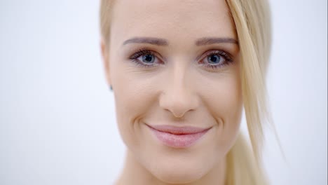 Close-up-Smiling-Face-of-Pretty-Blond-Female
