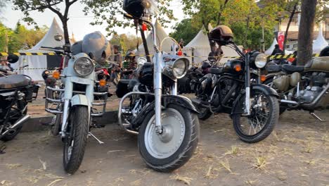 a-row-of-classic-motorcycles-parked-at-a-classic-and-vintage-motorcycle-community-event