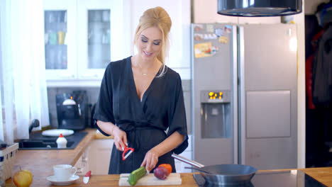 Stylish-woman-preparing-dinner-in-the-kitchen
