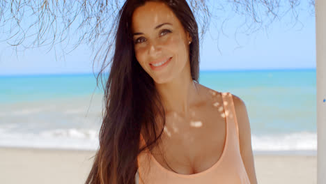 Attractive-Long-Haired-Young-Woman-at-the-Beach