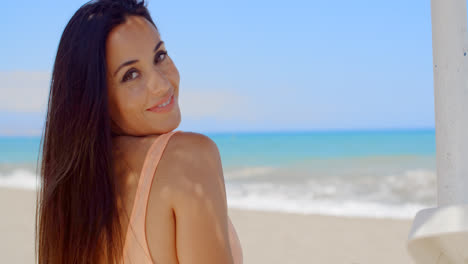 Attractive-Lady-at-the-Beach-Smiling-at-Camera