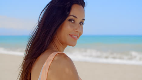 Pretty-Woman-at-the-Beach-Smiling-at-the-Camera