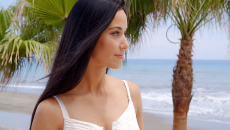 Woman-on-Tropical-Beach-Looking-into-the-Distance