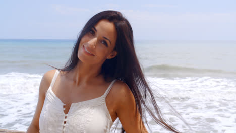 Hispanic-Young-Lady-in-White-Enjoying-at-the-Beach