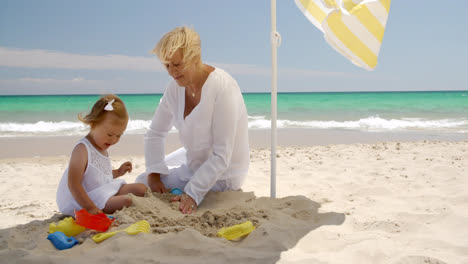 Grandma-and-Little-Girl-Bonding-at-the-Beach