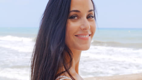 Gorgeous-Young-Lady-at-the-Beach-Smiling-at-Camera