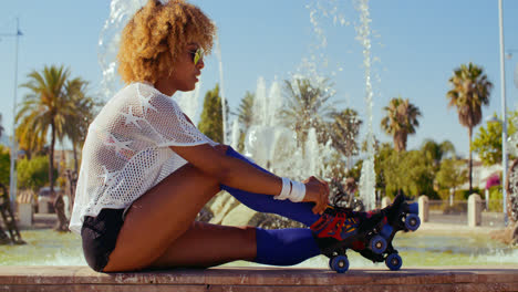Sexy-Girl-Adjusting-Her-Roller-Skates