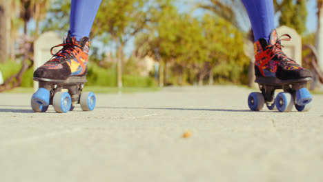 Low-Angle-Video-of-a-Girl-Riding-Roller-Skates