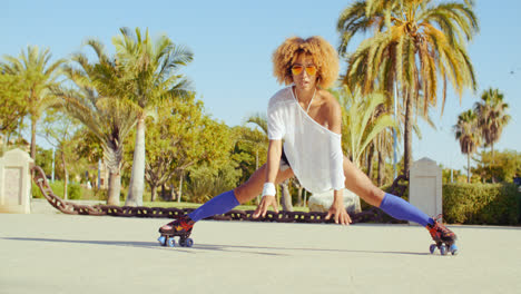 Sexy-Flexible-Girl-Doing-Splits-on-Roller-Skates