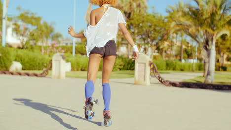 Sexy-Back-of-Riding-Girl-on-Roller-Skates