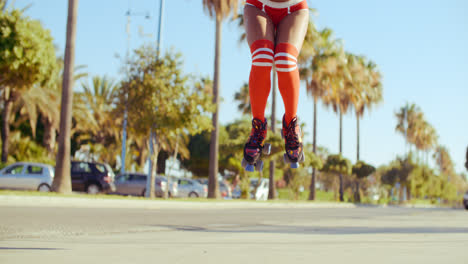 Girl-in-Skimpy-Shorts-Jumping-on-Roller-Skates
