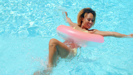 Sexy-Girl-in-Bikini-Resting-at-Swimming-Pool