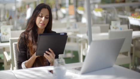 Attractive-businesswoman-using-a-tablet-pc