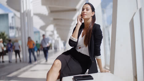 Businesswoman-taking-a-call-on-her-mobile